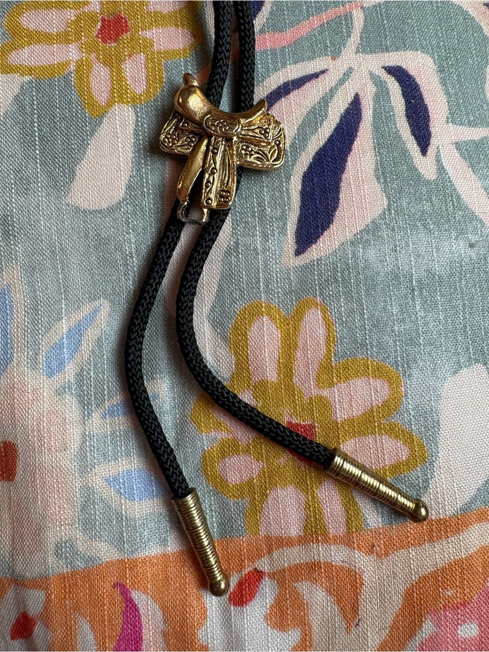 Vintage Gold Tone Western Saddle Bolo Tie | Black Braided Cord